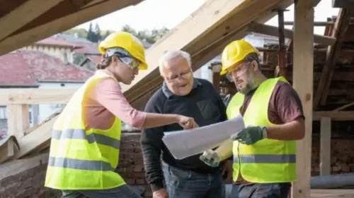 Roofing contractor consulting with a homeowner in Springdale, Arkansas